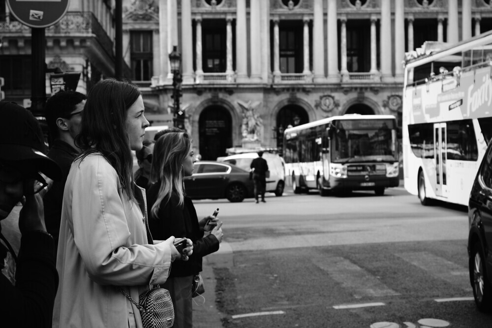 busy woman waiting to cross the road