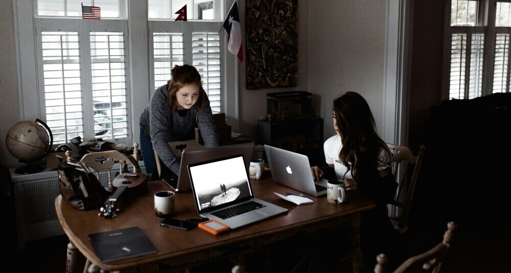 women in tech working late