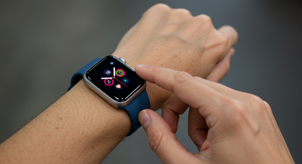 Close-up showing diverse hands wearing Apple Watch Series 10, emphasizing inclusivity and ease of use.