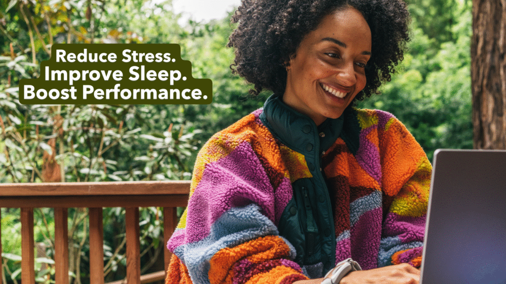 Apollo Wearable Reduce Stress Improve Sleep Boost Performance. Happy woman working on her laptop.