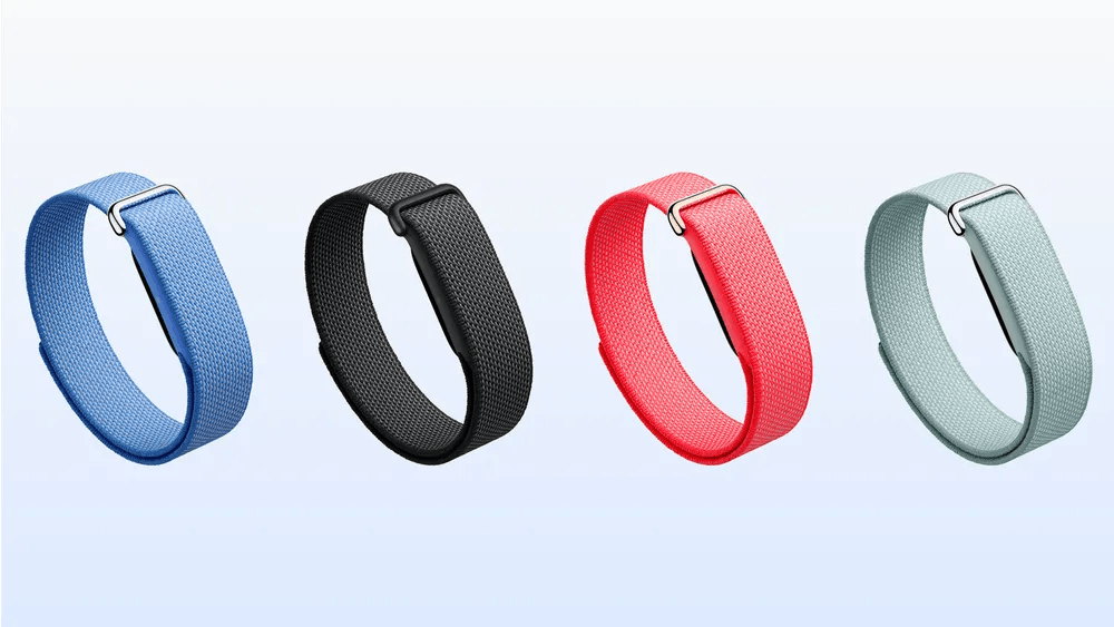 The All New Fitbit Air. Four textured wristbands in blue, black, red, and gray.